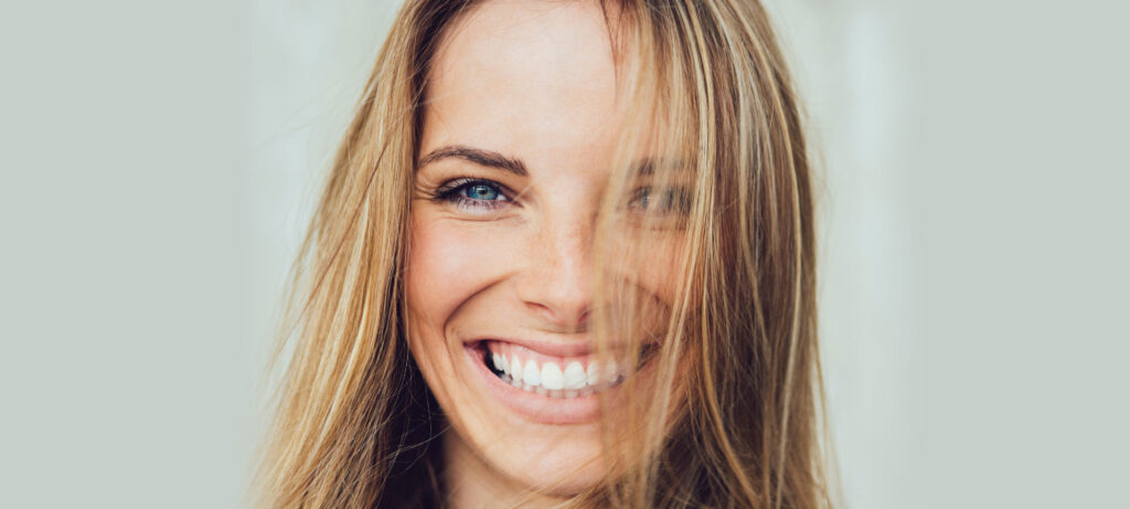 lady smiling after cosmetic dentistry